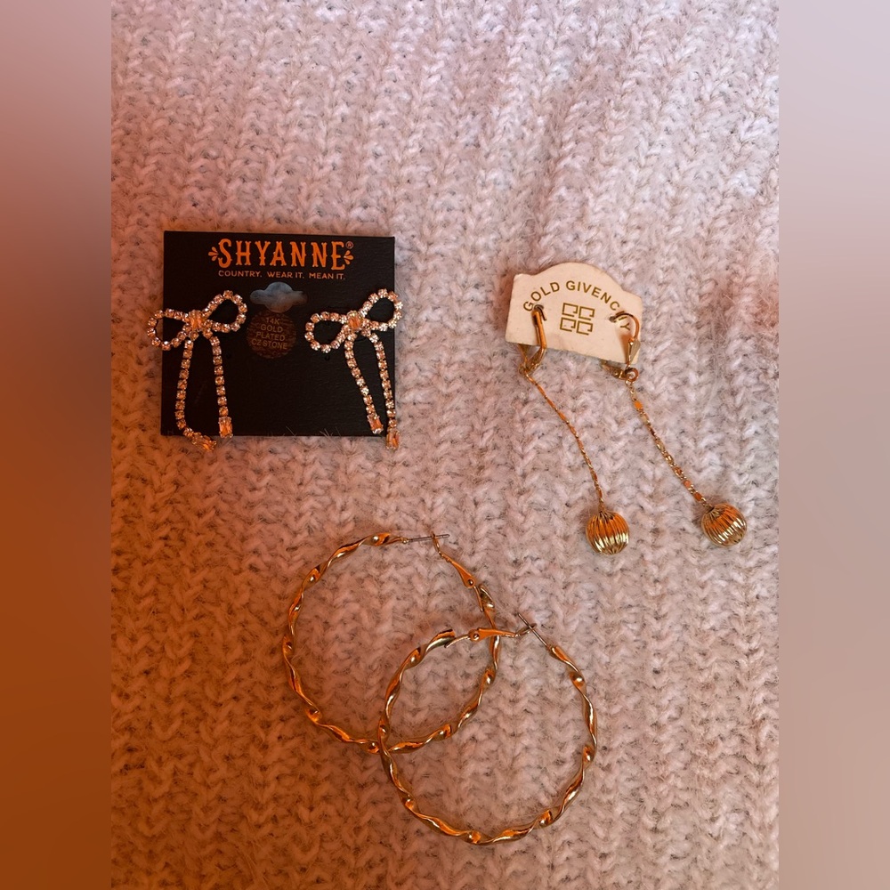 Collection of Elegant Gold and Rhinestone Earrings.